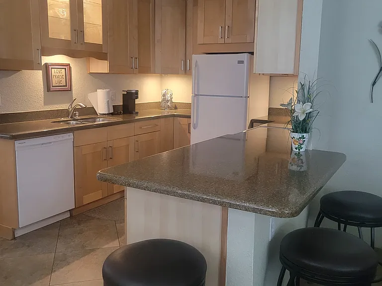 Kitchen with lighted cabinets.