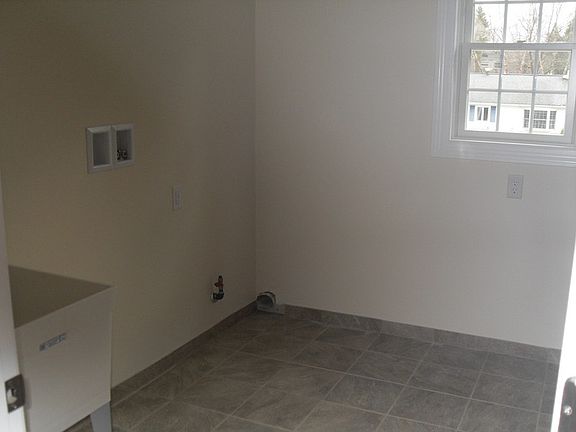 Great Room : Cozy, Spacious Great Room is perfect for Family Time. Opens to Kitchen.