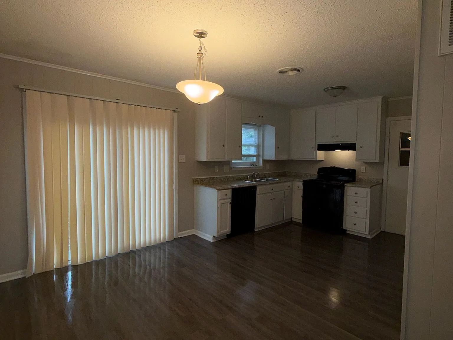 Cozy Single-Story Home with Attached Garage & Fenced Backyard — Photo 3