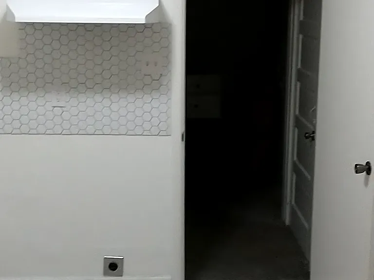 Entry to laundry/storage room