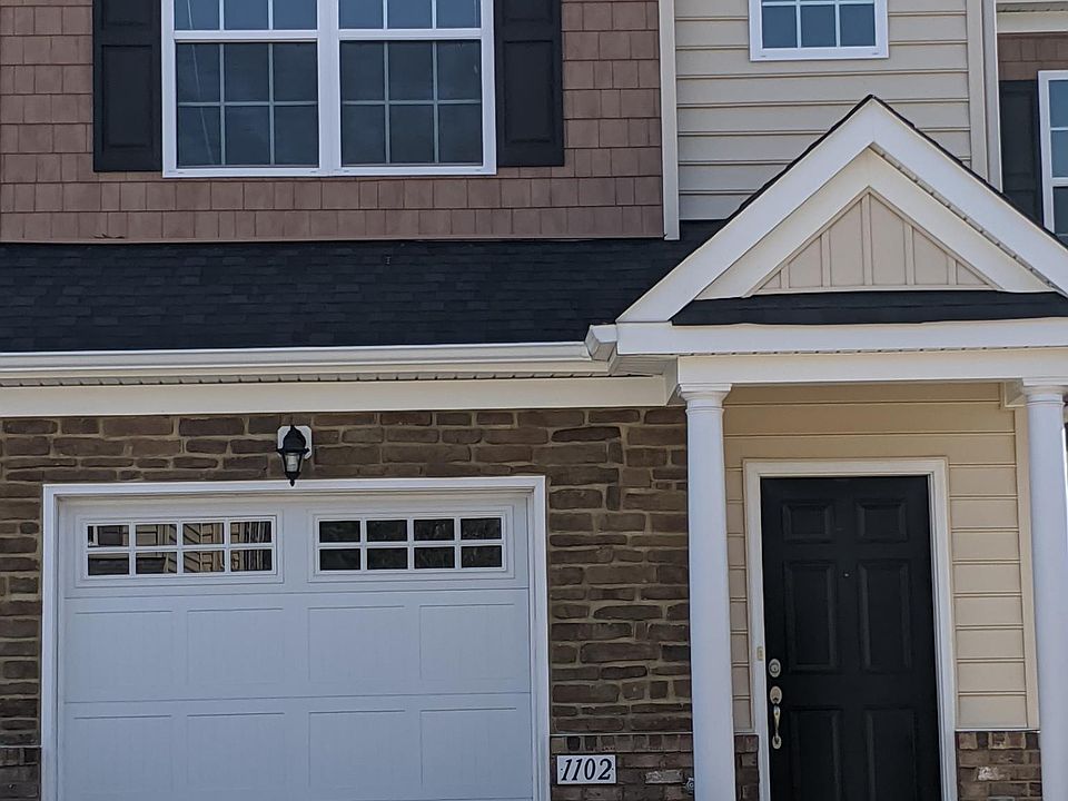 Front door with single garage.