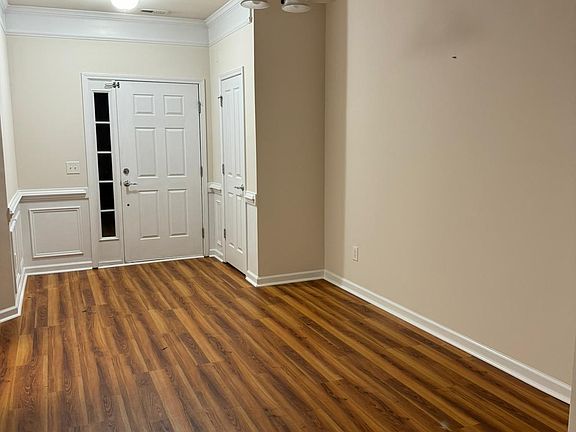 Luxurious LVP flooring adds contemporary charm to this townhouse. Stylish, durable, and perfect for modern living.