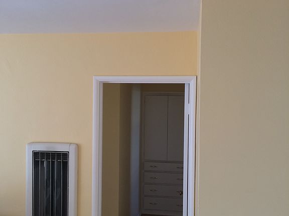 Hallway to bedroom and bathroom