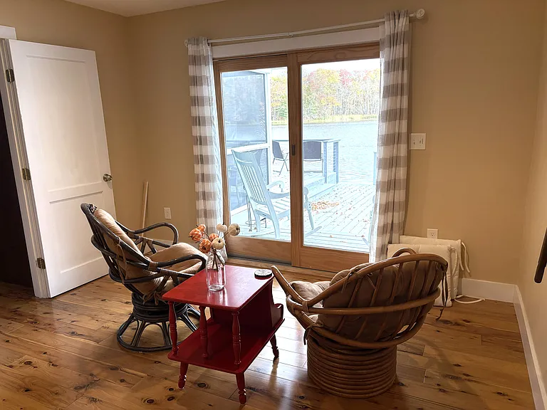 Master bedroom comforts...chairs to look onto the water