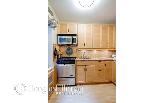 Sold by Douglas Elliman | media 10