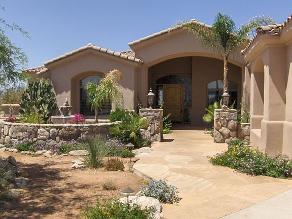 Lovely flagstone entrance with fountain