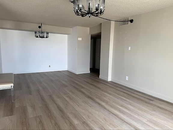Spacious living room/dining area.