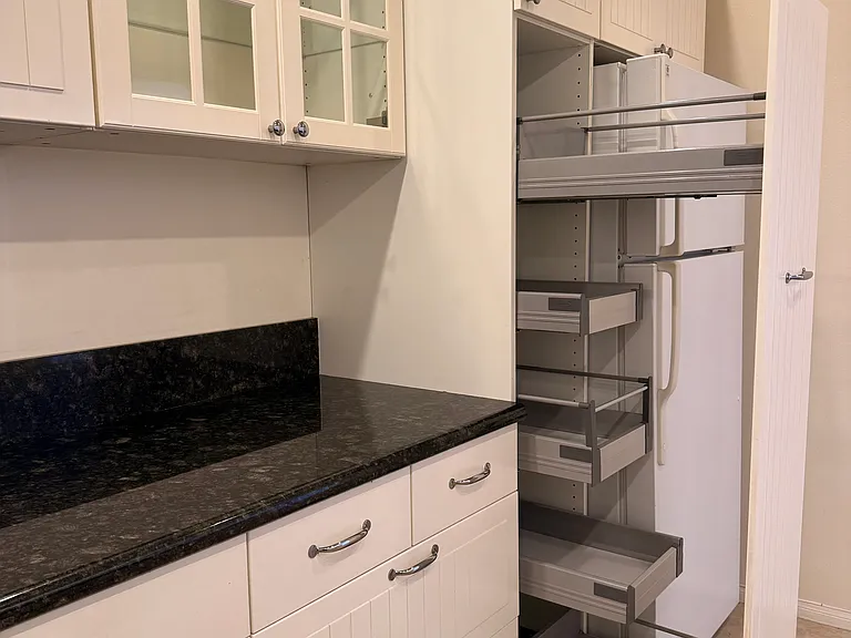 Updated kitchen with pull-out pantry storage