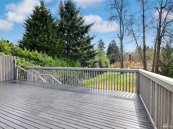 large back deck overlooks the huge back yard. 