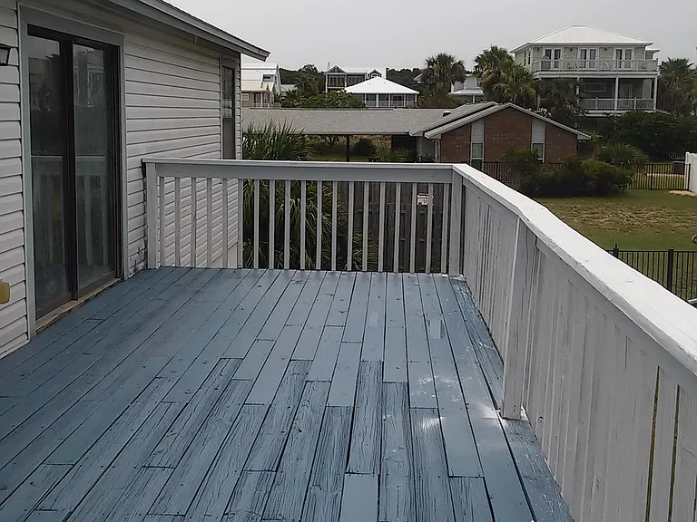 View of the side balcony. Fort clinch park is just behind the row of houses in the back.