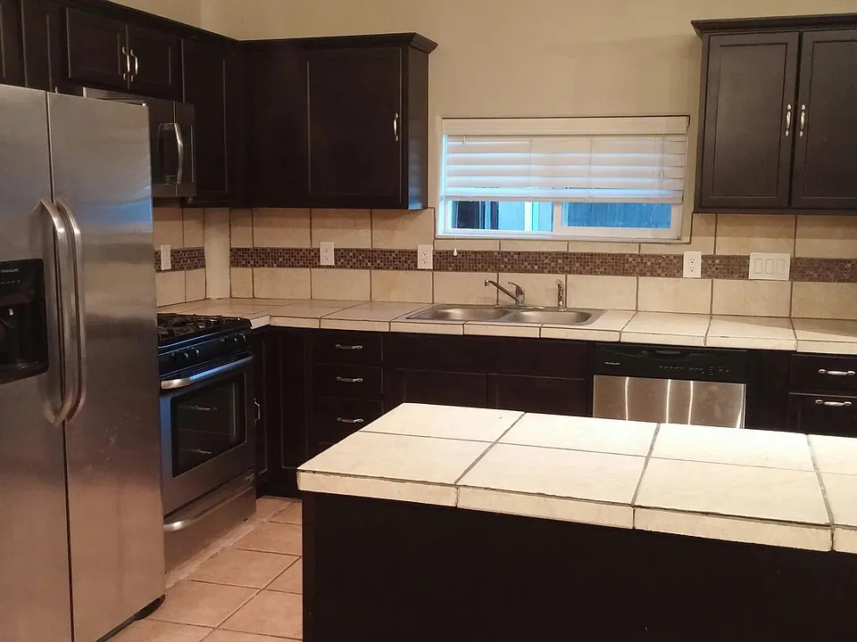 Kitchen has island.