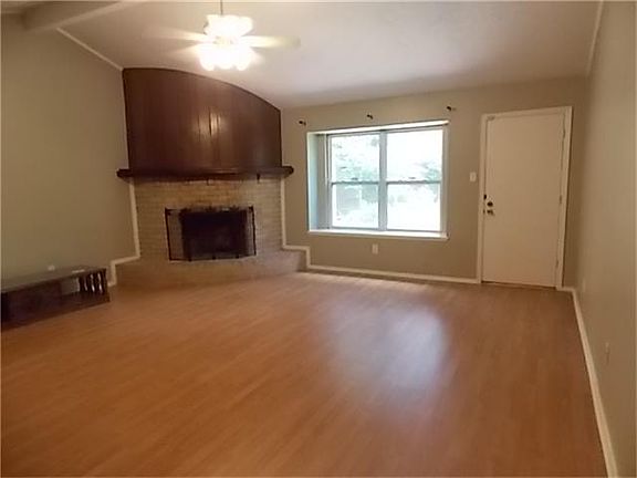 DEN - FIREPLACE, TALL CEILING, FAN, LAMINATE FLOORS