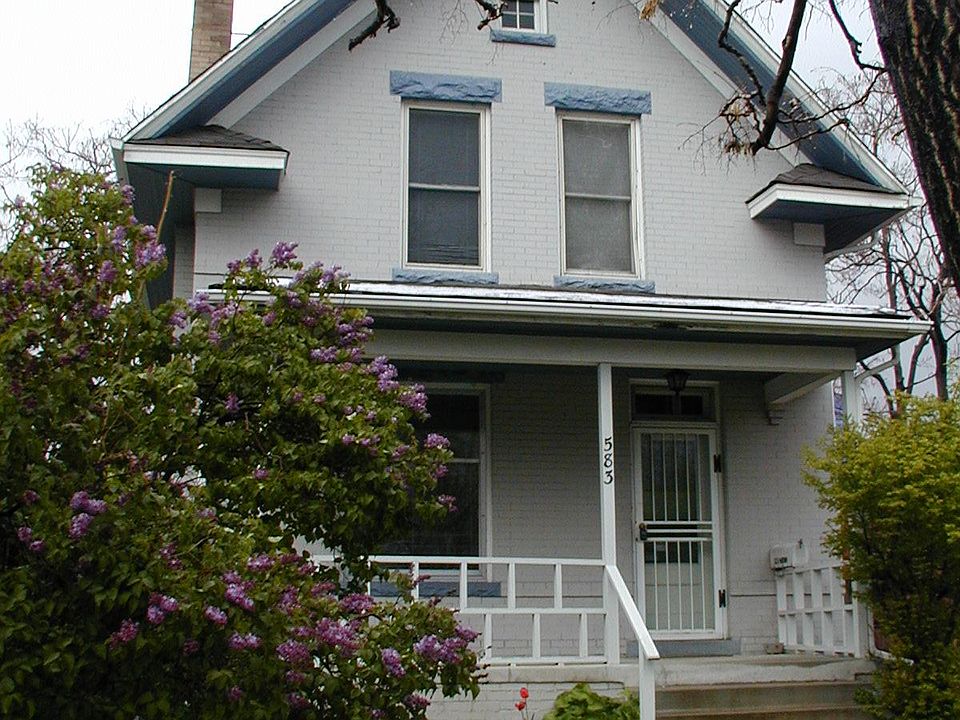 Story and a half charming city cottage