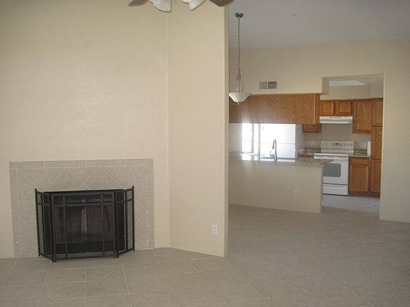 Living room to dining area to kitchen