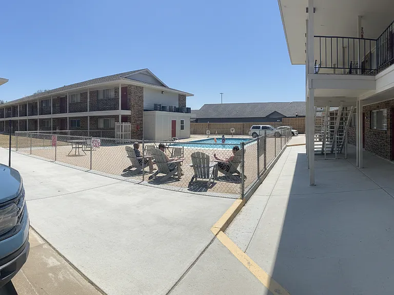 Pool + Lounge Furniture for Resident's Use Memorial Day to Labor Day
