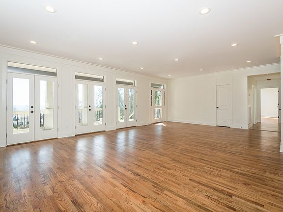 Fabulous open floor plan....
Huge Great Room with 3 sets of french doors leading out onto porch...