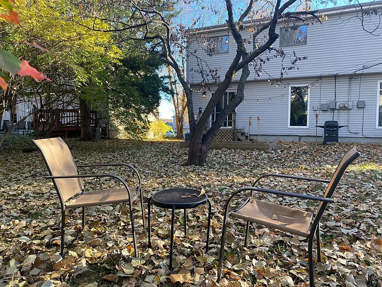 Backyard is very included with a privacy fence along the back and bushes on the east side of the lot of the back yard that create an enclosed backyard feel.