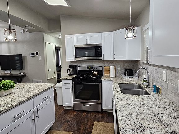 Updated cabinets, granite counter tops.