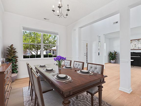 Large formal dining room. Photo virtually staged.