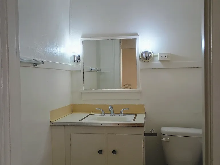 Bathroom vanity, new vinyl flooring.