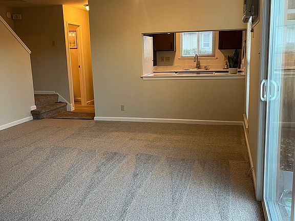 Living area as viewed from back towards entrance