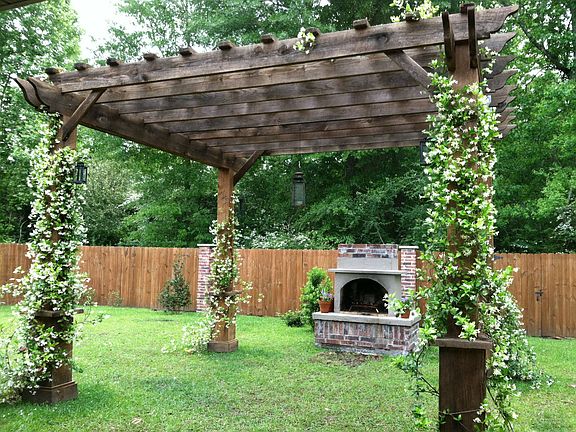 pergola w/ outdoor fireplace