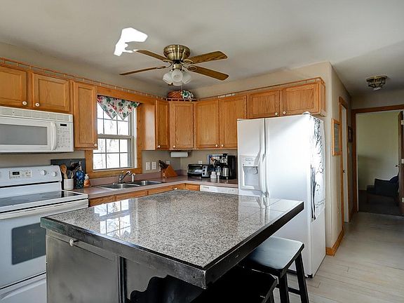 kitchen with every pot, pan, margarita glass