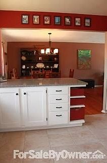 Kitchen 3
						:
						Cabinet hides two pull out drawers for your cookware, tons of storage.