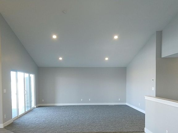 Living room with vaulted ceiling