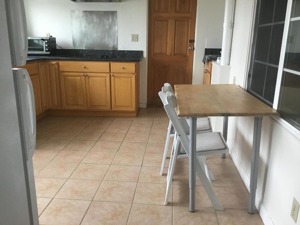 Kitchen; Dining Table, Toaster Oven, and Microwave Included