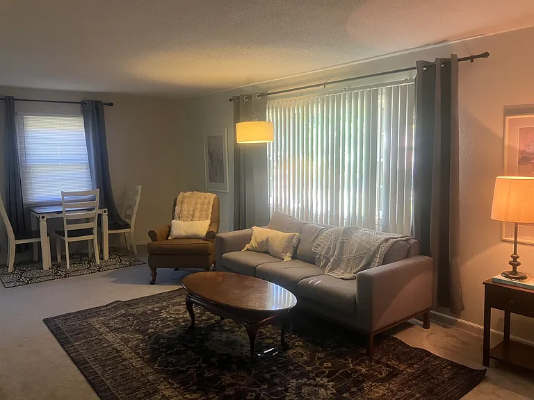 view of living room from bedroom hallway