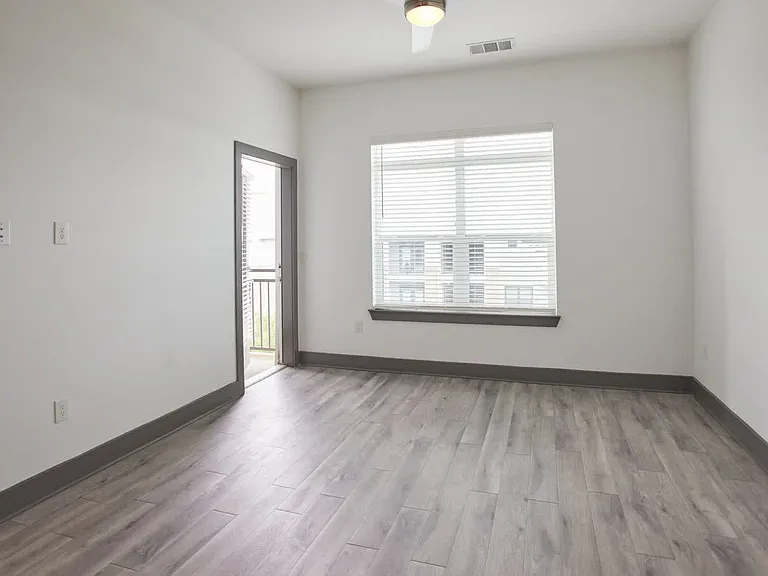 Living Room with Balcony and Hard Surface Flooring
