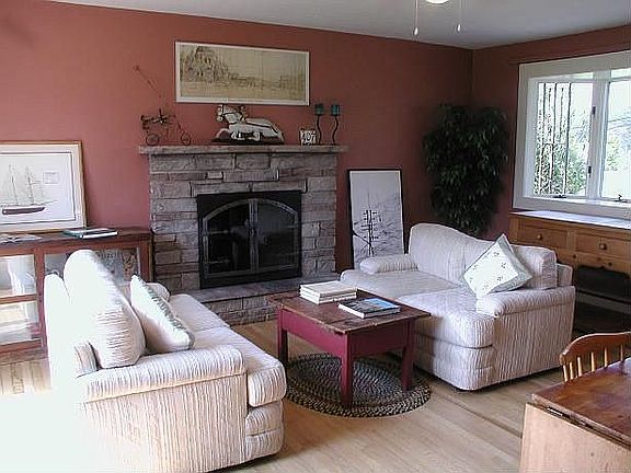 Warm Tennessee marble hearth, giant Anderson bay window