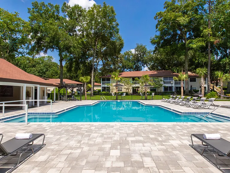 Our expansive sundeck promises endless fun with ample seating options, including loungers and tables.