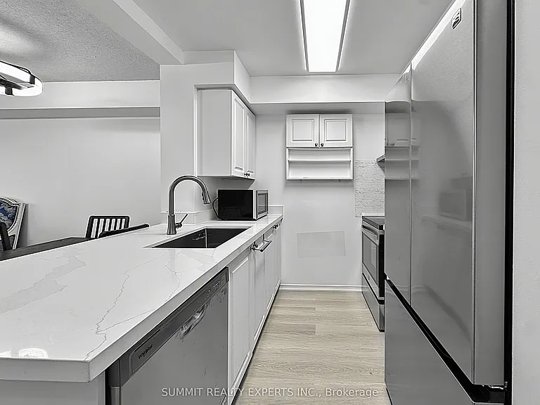 300 Ray Lawson Blvd #512 — Photo 10