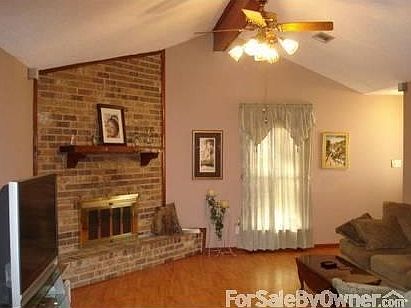 Living Room with Wood Burning Fireplace
