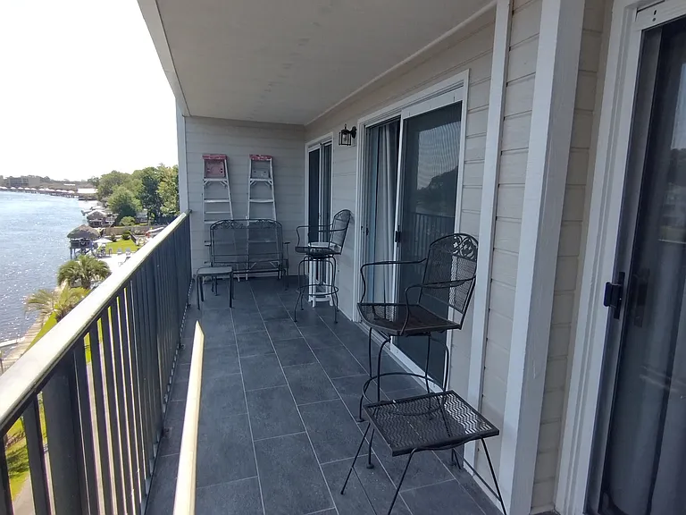 Large balcony with 3 sliding doors