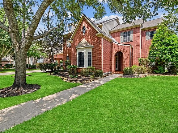 A shaded walkway leads you to the front door.