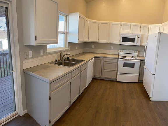 Updated Kitchen-new cabinet doors, freshly painted, brushed nickel hardware