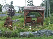 Gazebo with 4 Rocking chair and a water Mill