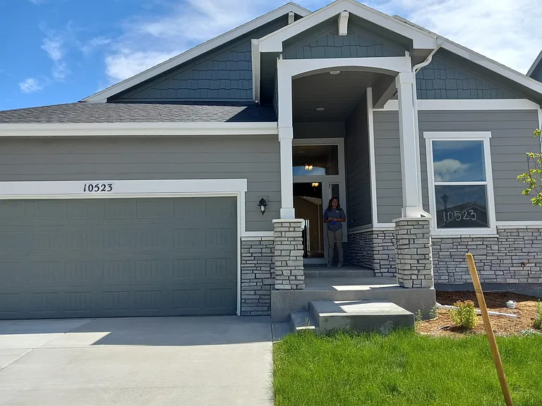 10523 Summer Ridge Drive. Two-car garage, (oversized), extra-tall front entryway.