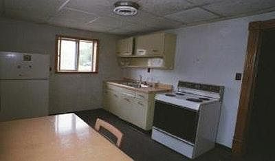 Old photo. New kitchen has dishwasher