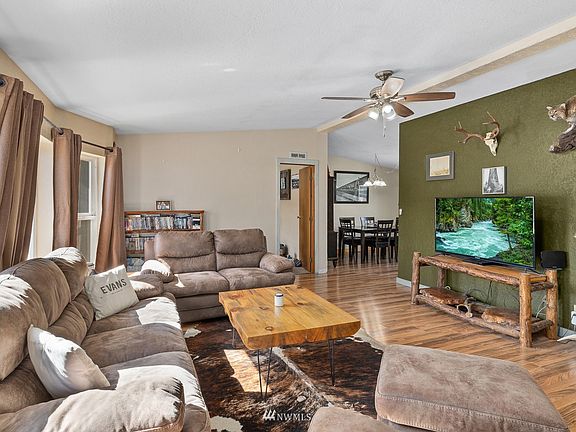 Lots of thoughtful things in this home- including custom wood trim, newer flooring, new 40 year roof, & we have A/C!!