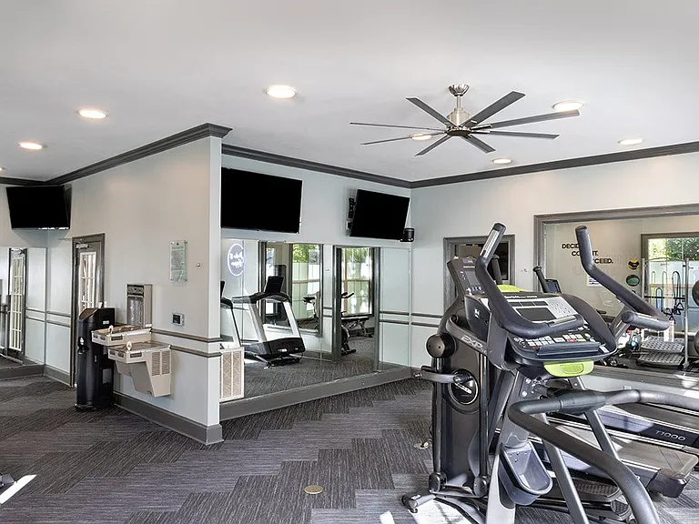 24-hour fitness center with strength and cardio equipment