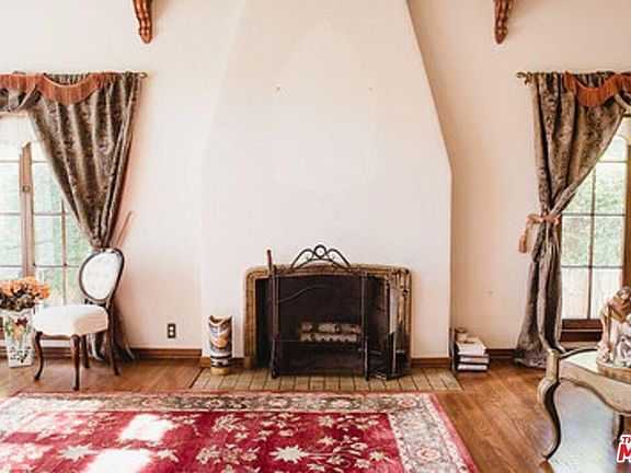 living room fireplace previously furnished garage