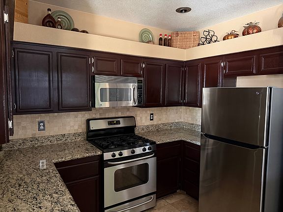 Stainless stove, microwave, refrigerator and dishwasher included