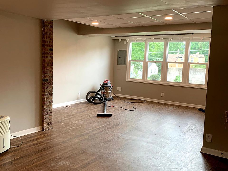 large living and dining area (vinyl plank flooring throughout)