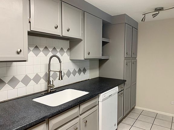 Kitchen was just updated with new countertops, sink and extended pantry.