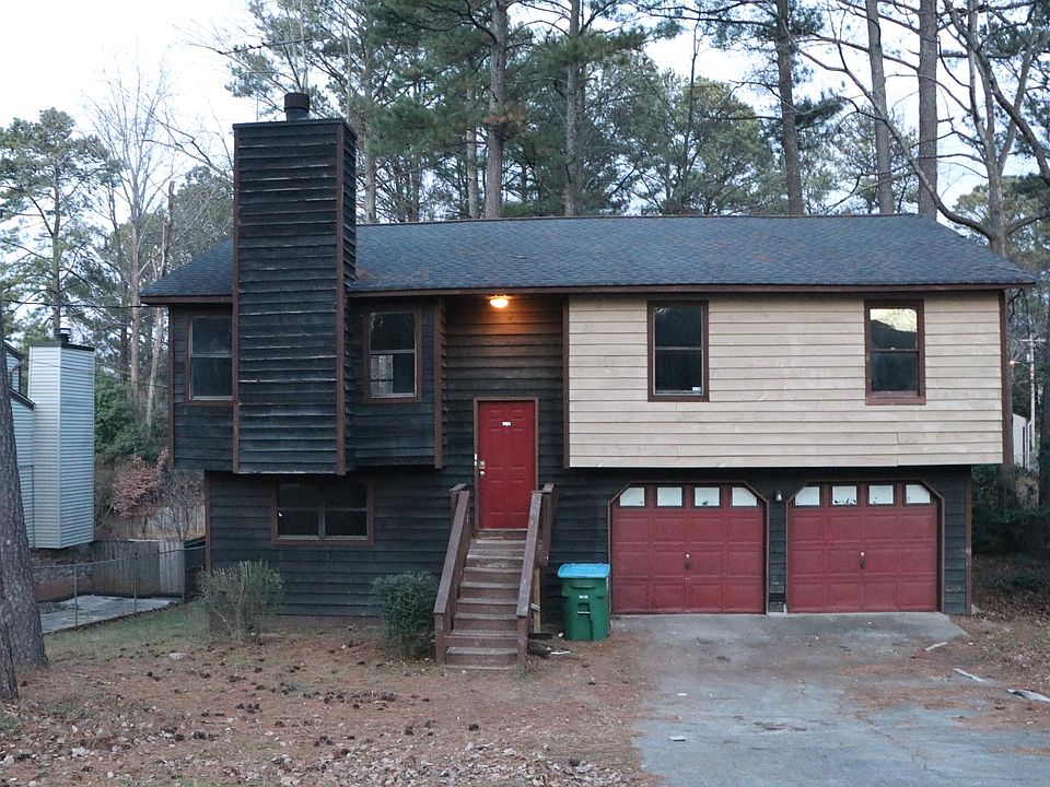 Front of house with two car garage