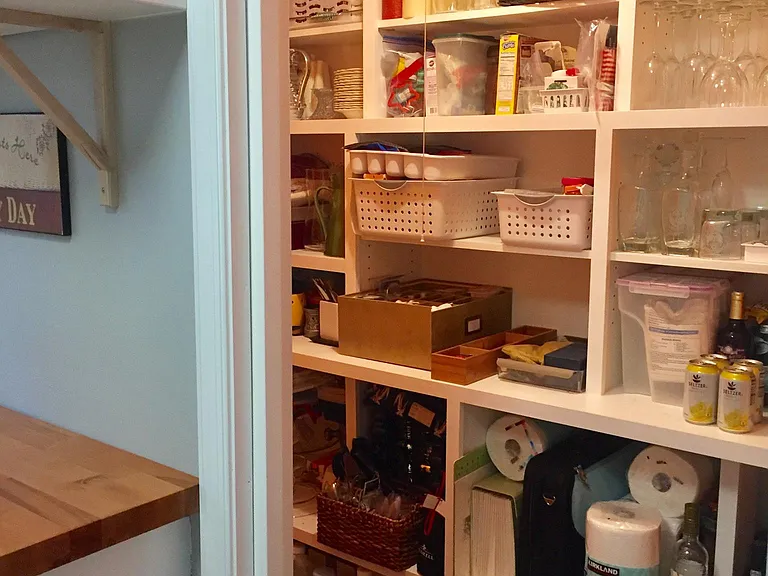 Large pantry with pocket door off of laundry room. Tons of storage!